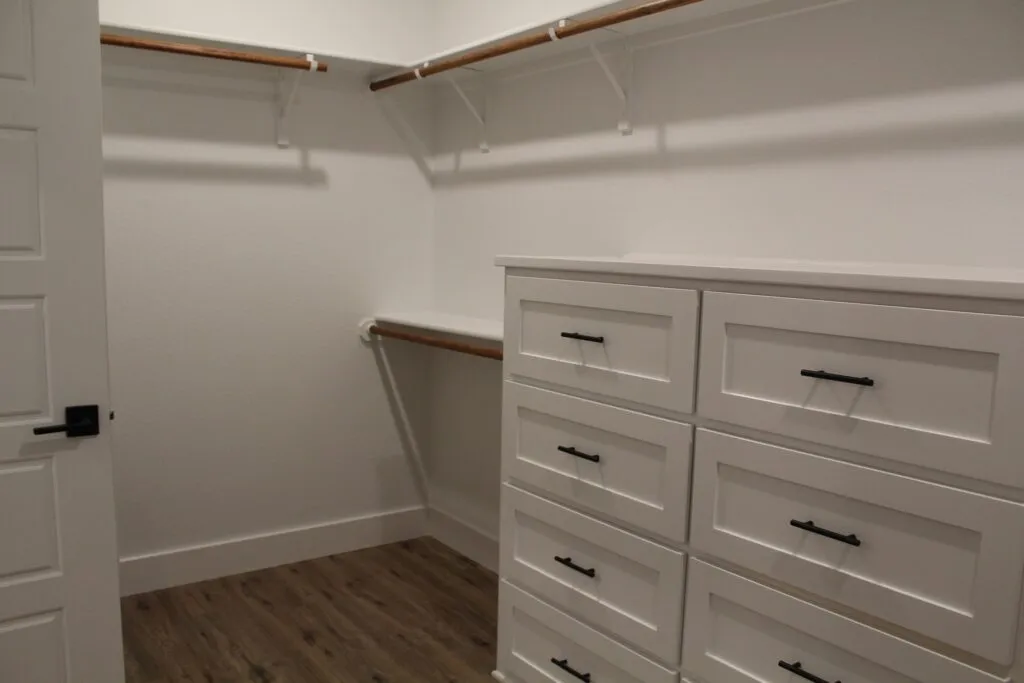 Larsen Homes & Consulting Waco Texas Walk-in Closet Custom Drawers & Cabinets